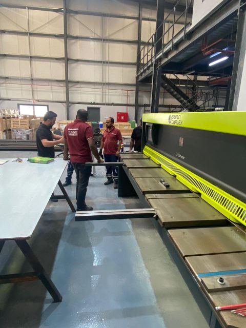 MASSAED team working along the sheet-metal fabrication line